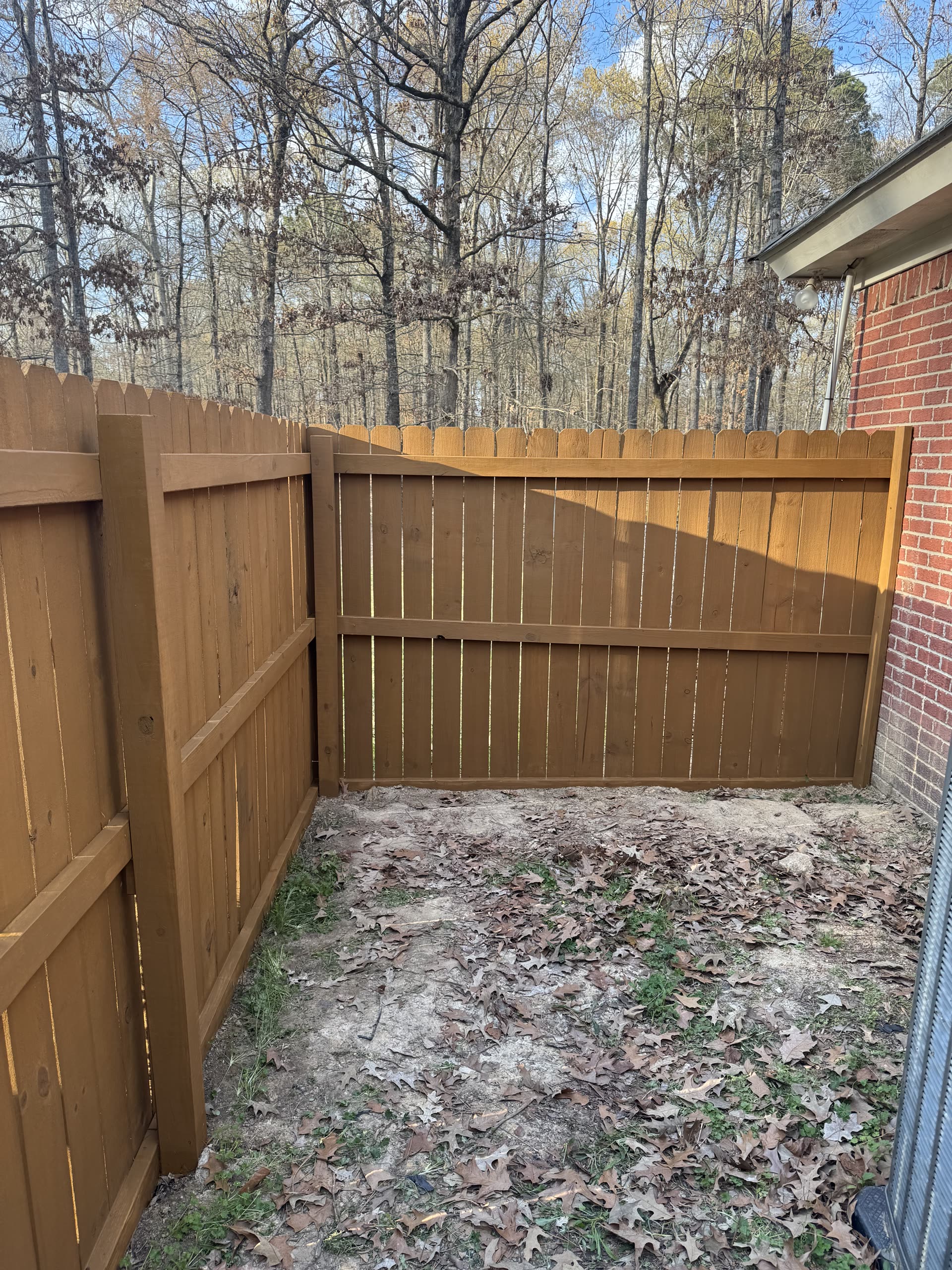Stained brown fence interior view in Rankin County, Mississippi